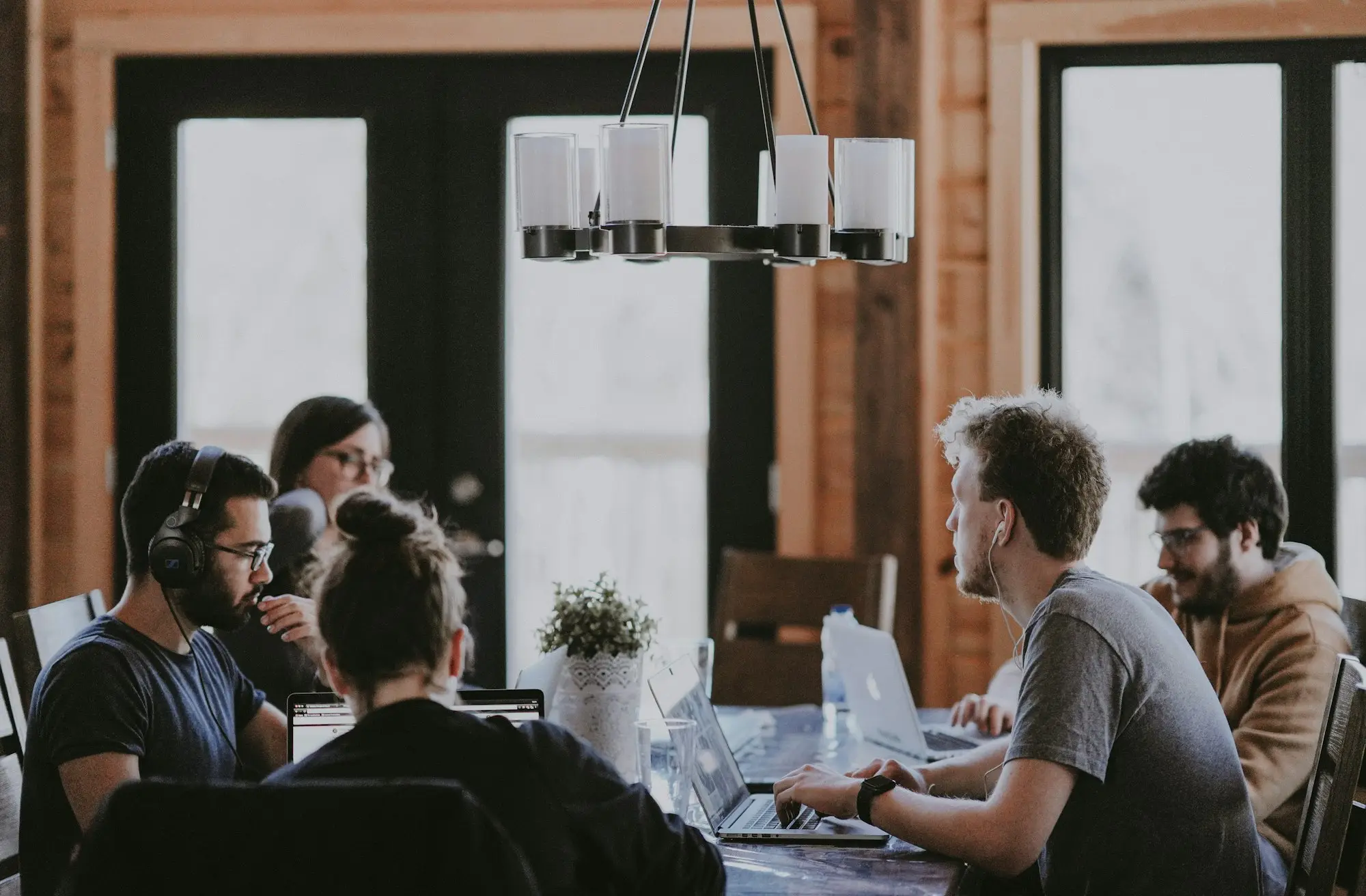Small accounting or professional services team meeting around a table
